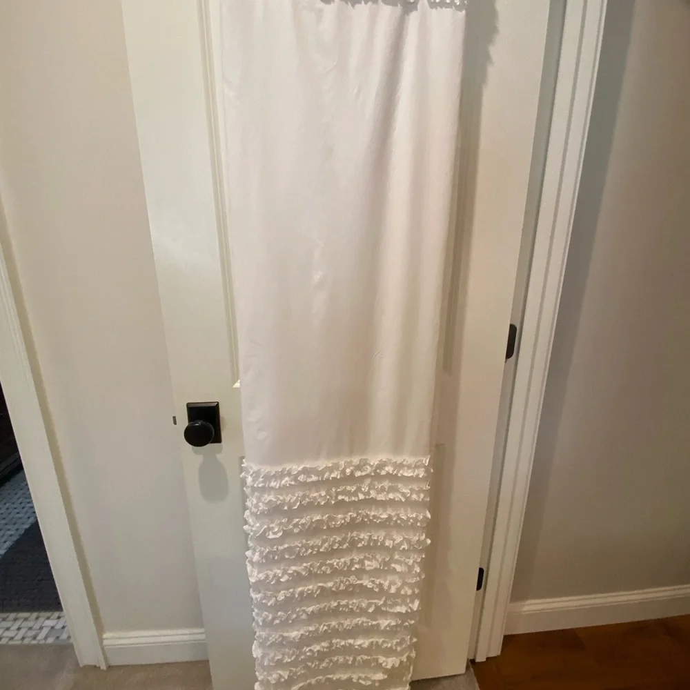 Anthropology beautiful white ruffle shower curtain.